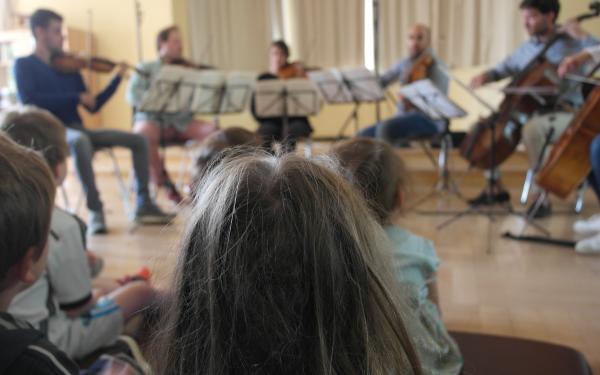 Musethica-Konzert an der PFH-Fachschule mit Kindern aus umliegenden Kitas